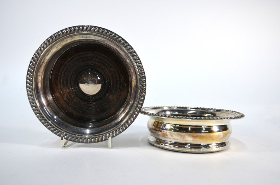 A pair of silver bottle coasters with gadrooned rims and turned wood bases - Image 2 of 3