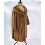A mid-brown mink fur coat