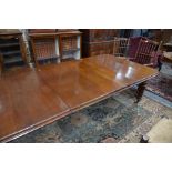 A Victorian mahogany extending wind-out dining table