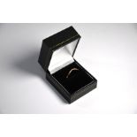 A 9ct rose gold diamond set ring