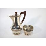 A heavy quality planished silver coffee pot and sugar basin