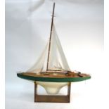 A solid hull pond-yacht, sloop-rigged