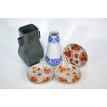 A Guanyao style Hu vase, blue and white vase and three 19th century saucers (5)