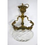 An ornate gilt brass hanging light fitting