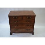 A George III mahogany chest of two short over three long graduated drawers