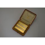Cartier - A three coloured silver gilt cigarette case