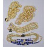 Four imitation pearl necklaces