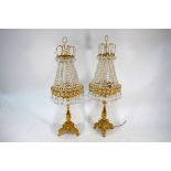 A good pair of Austrian ormolu glass lustre strung table lamps