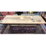 A substantial bleached/weathered oak refectory dining table