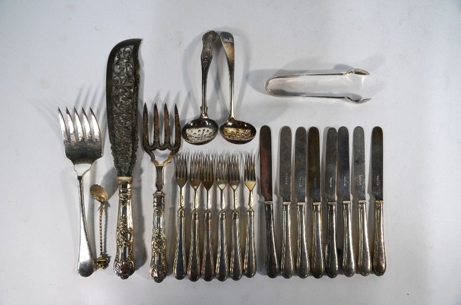 A set of eight Victorian silver dessert knives and six forks