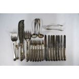 A set of eight Victorian silver dessert knives and six forks