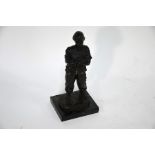 A brown-patinated bronze figure of a British soldier
