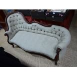 An antique mahogany framed chaise longue, modern linen upholstered