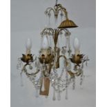 Liberty, London, a gilt metal opaque teardrop and crystal strung chandelier