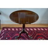 A George III mahogany tilt-top tripod table