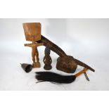 An African tribal carved wood headdress and other items