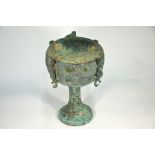 A Chinese bronze ritual food vessel and cover, Dou