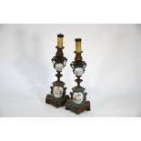 A pair of 19th century French ormolu garniture candlesticks in the Empire style
