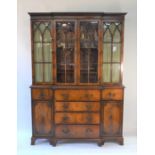 A Victorian style mahogany breakfront library bookcase