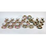 A quantity of Austrian china cabinet cups and saucers
