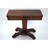 A 19th century rosewood fold-over card table