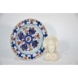 A Chinese 18th century Imari decorated dish to/w a dehua bust of Guanyin (2)