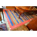 A large Turkish kelim carpet, 300 x 186 cm