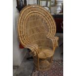 A 1970s wicker peacock chair