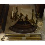 Two bundles of brass stair-rods with brackets