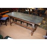 An antique provincial pine dining table and chairs