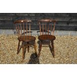 A pair of antique provincial spindle back side chairs