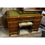 A mahogany twin pedestal desk