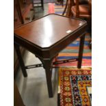 A small mahogany side table