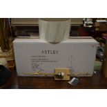 A boxed as new Astley wall light