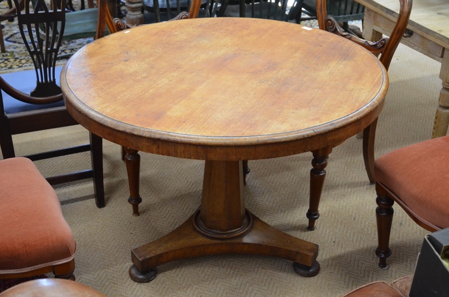 A 19th century mahogany breakfast table