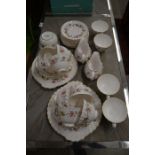 A Royal Doulton Rosell pattern (H4976) double tea service for twelve, (one sugar basin)