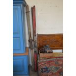 Two pairs of vintage wooden ski, boots and ice skates