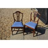 A set of six mahogany Hepplewhite style shield back dining chairs