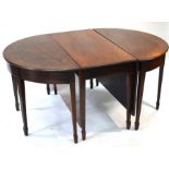 A George III boxwood line inlaid mahogany d-end dining table