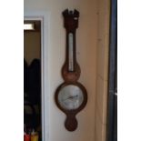 A 19th century walnut and shell inlaid banjo barometer