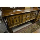 A 17th century style oak sideboard