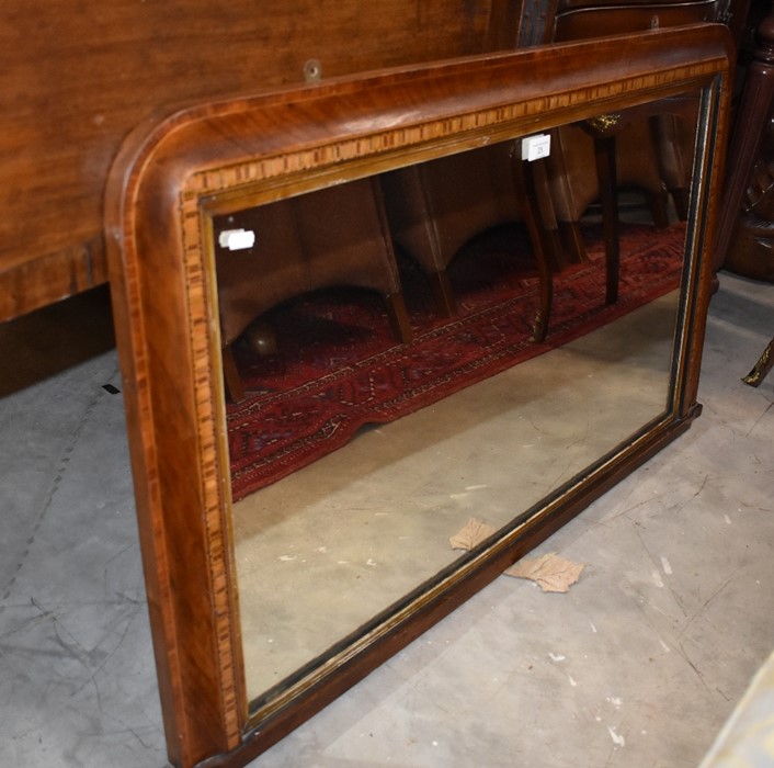 An Edwardian overmantle mirror