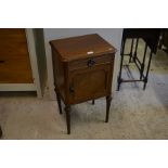 A French style walnut bedside cabinet