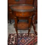 A French mahogany etagere