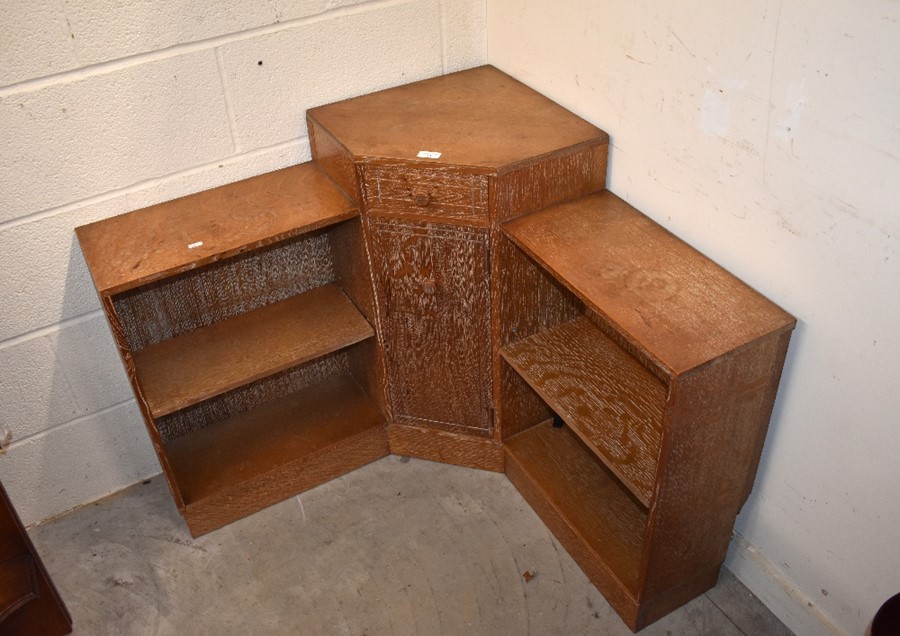 A Heal's style limed oak corner bookcase