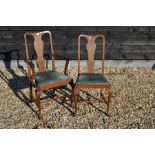 A set of eight mahogany Queen Anne style high back dining chairs