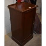 An Edwardian mahogany bedside cabinet