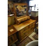 A late Victorian carved walnut wardrobe, chest and cabinet