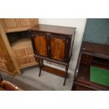 A Dutch mahogany and fruitwood drinks cabinet on stand