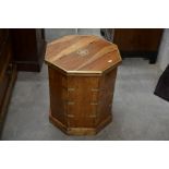 An Indonesian hardwood and brass mounted octagonal storage box